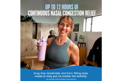 Breathe Right Original nasal strip during exercise supporting easier breathing.