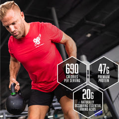 BSN TRUE-MASS prepared shake in a tall glass with creamy chocolate flavor