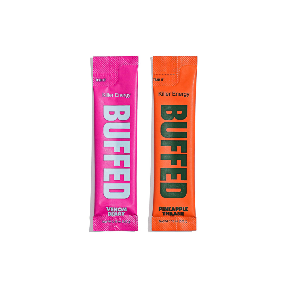 BUFFED Venom Berry energy drink in a glass shows refreshing flavor and fizz.