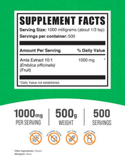BulkSupplements Amla Extract Powder scoop next to glass for easy mixing