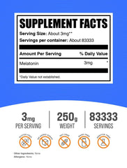 Close-up of BulkSupplements melatonin powder with scoop highlights precise 3 mg dosing.