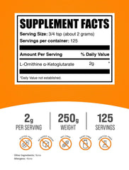 BulkSupplements OKG powder being poured, ideal for pre- or post-workout mixes.
