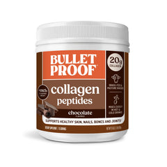 Bulletproof chocolate collagen peptides jar on kitchen counter supports skin and joints.