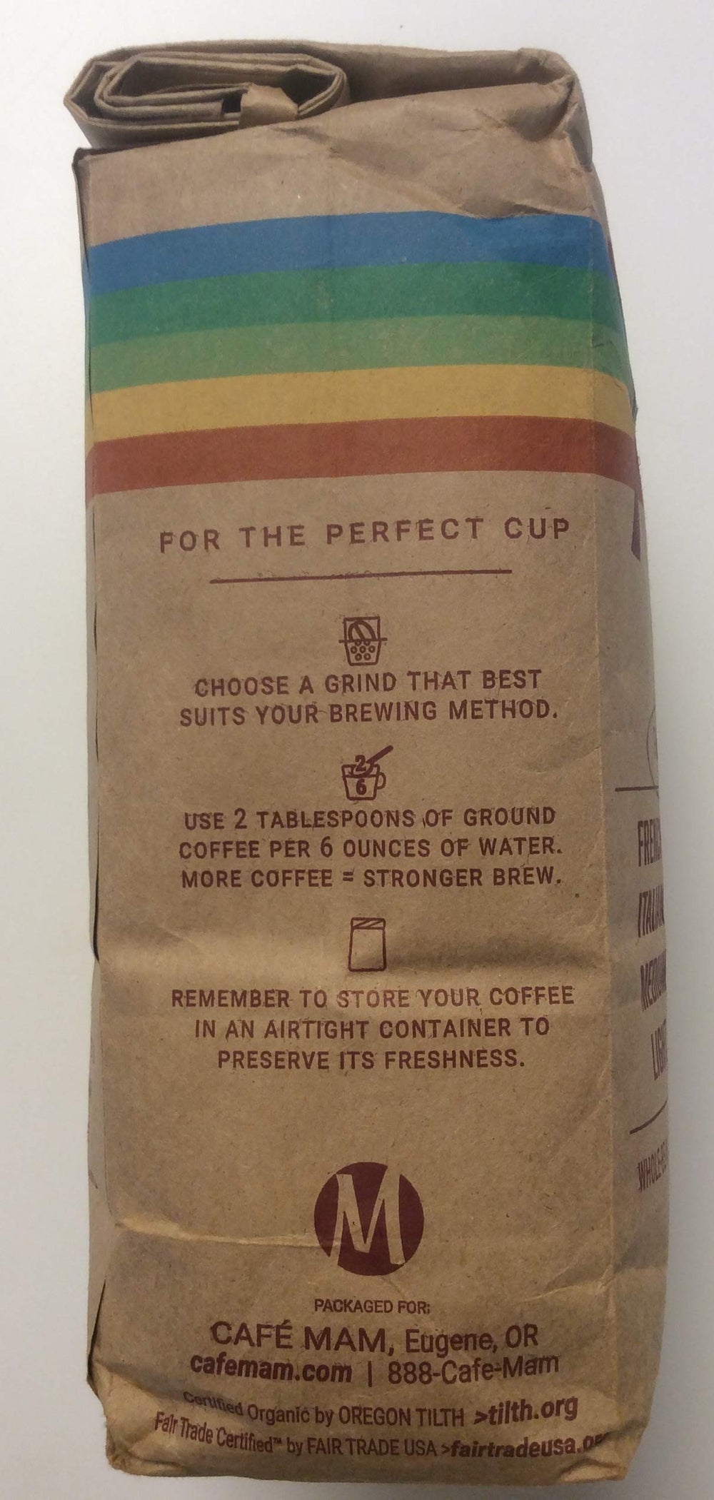 Cafe Mam Enema Coffee fair-trade label indicating ethical sourcing