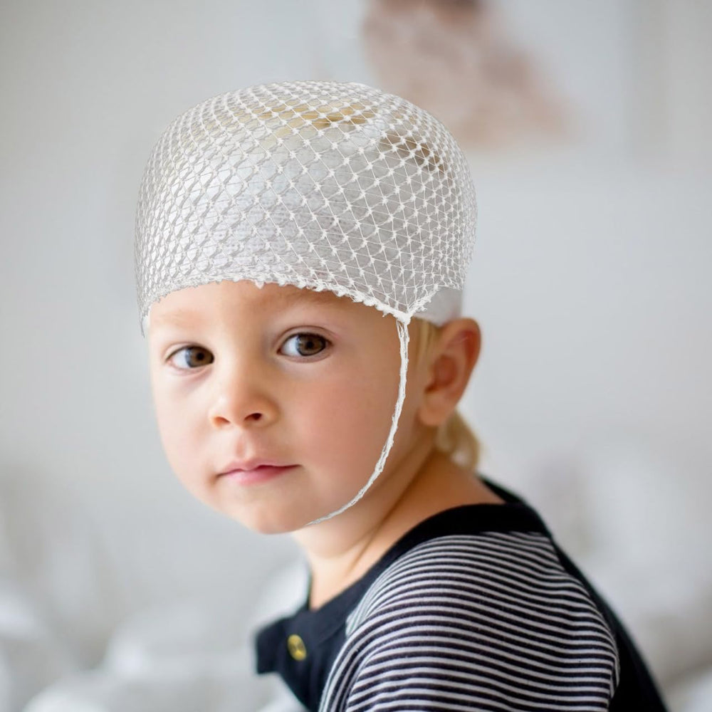 CALLARON one-size head cap fits most heads for versatile medical and salon use.