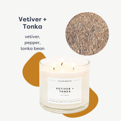 Calyan Vetiver & Tonka candle front view in premium glass jar with three wicks.