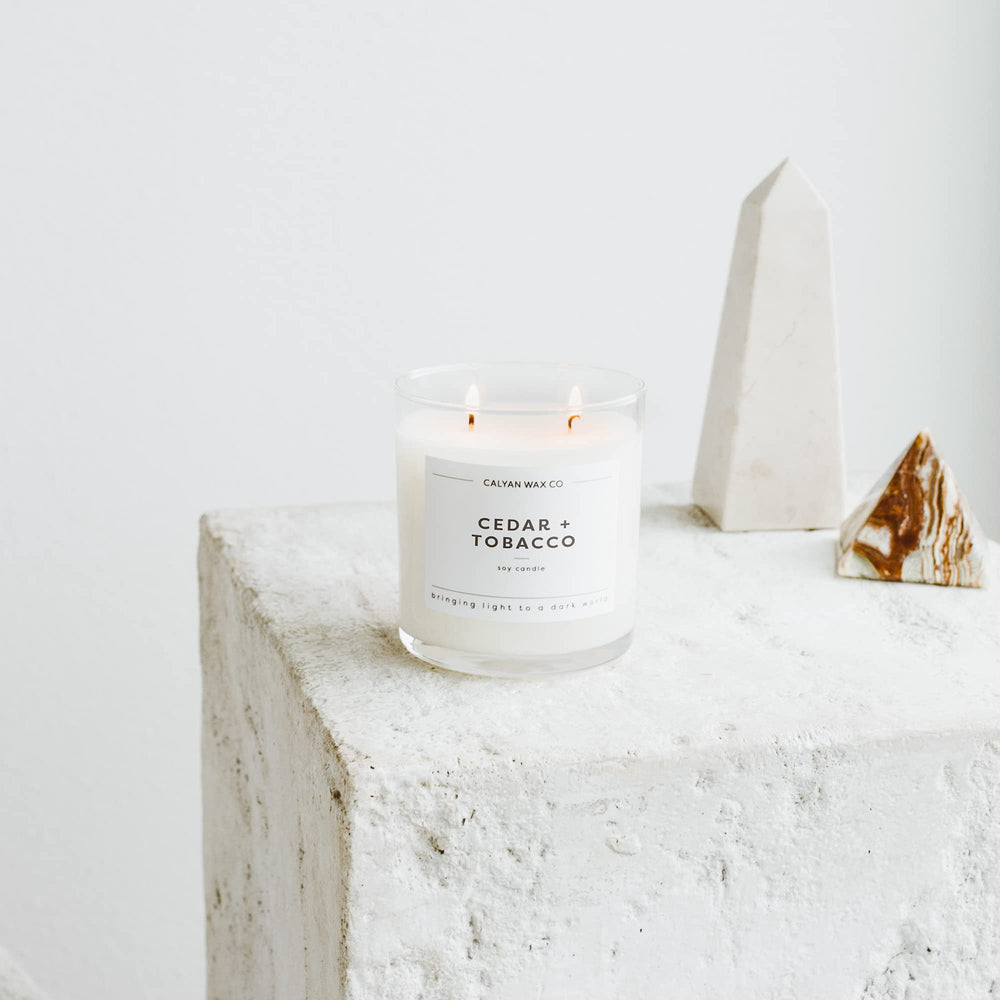 Calyan Wax Co Cedar & Tobacco candle close-up of the glass jar for gift-ready presentation