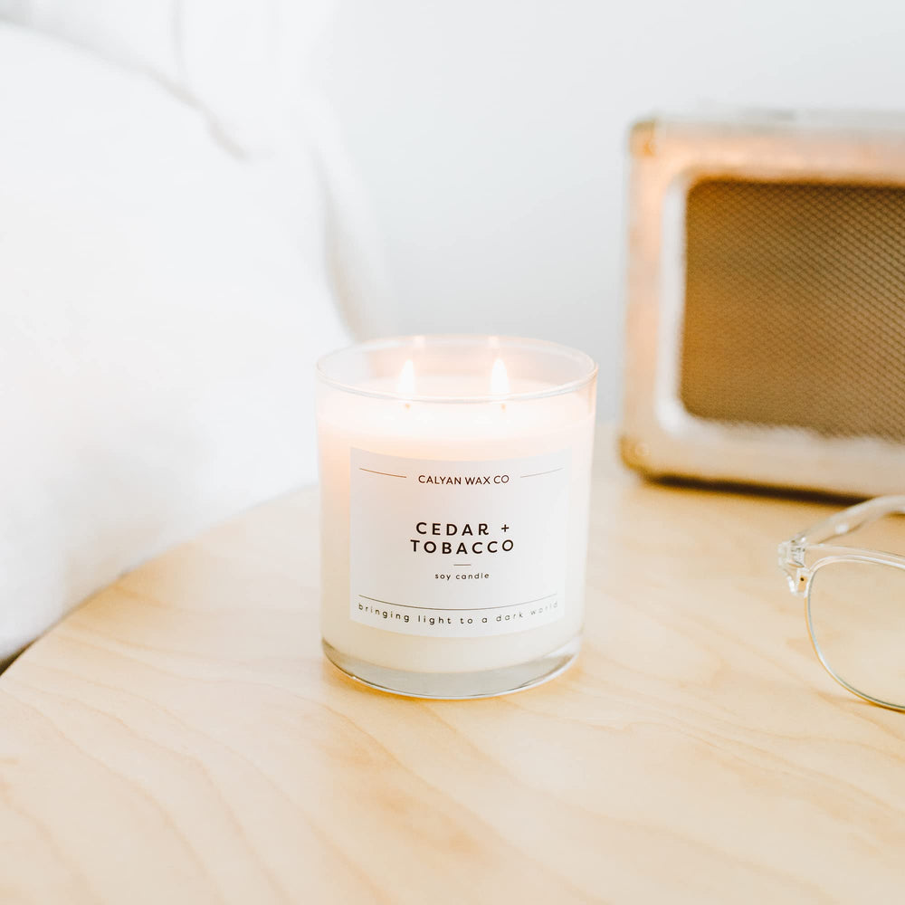 Calyan Wax Co Cedar & Tobacco candle with vanilla-amber notes