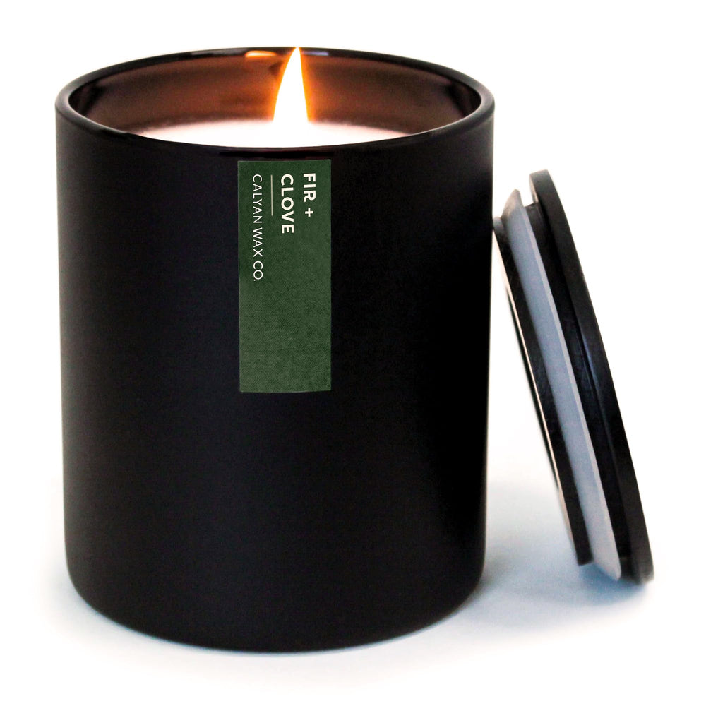 Calyan Wax Co Fir & Clove candle in a black tumbler jar for a luxurious home scent