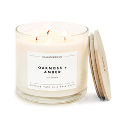 Calyan Wax Co. Oakmoss and Amber 3-wick candle in glass jar for extended ambiance
