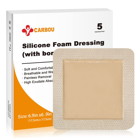 CARBOU sacral foam dressing applied on sacrum to maintain moist wound environment.