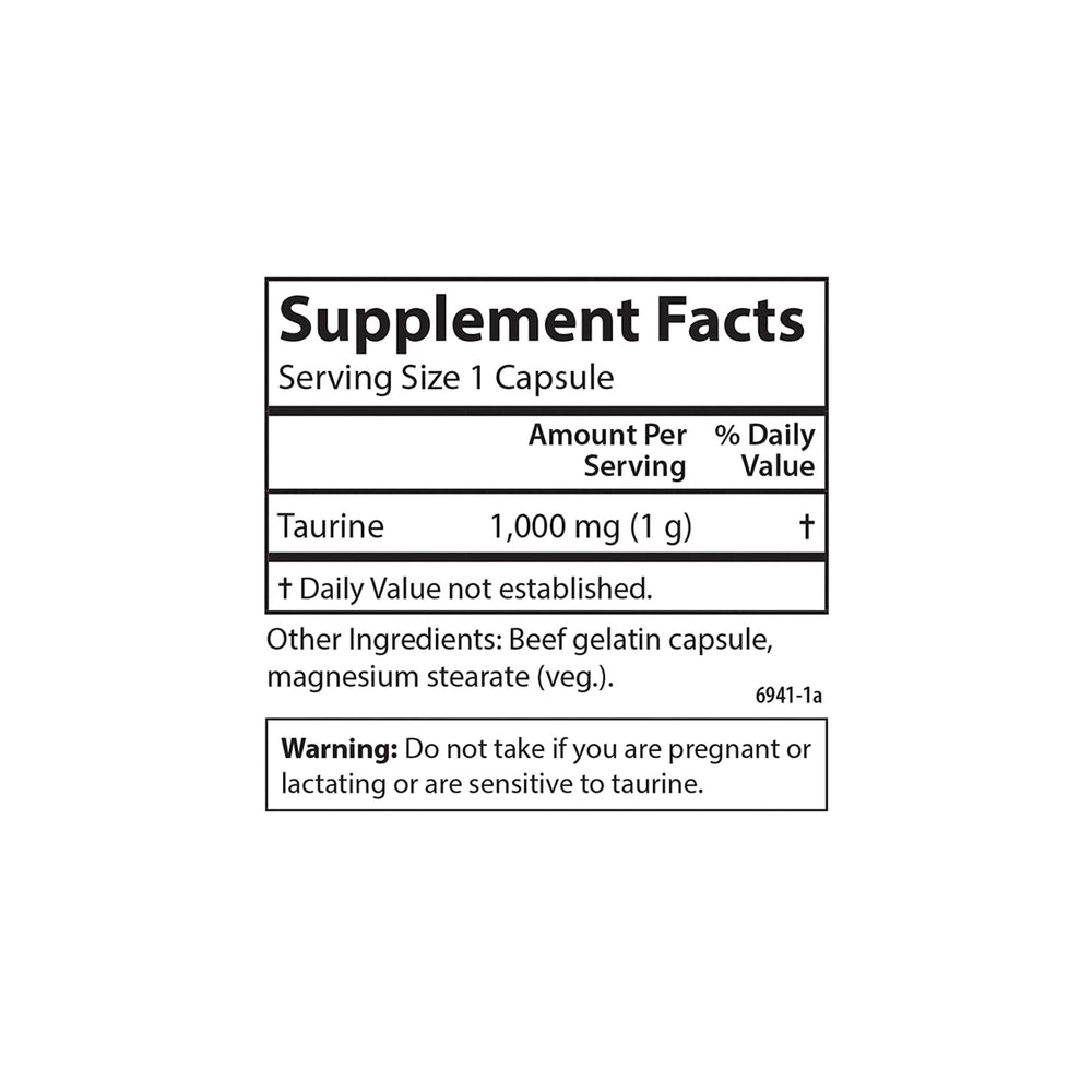 Carlson Taurine capsules spread on white background for easy dosage.