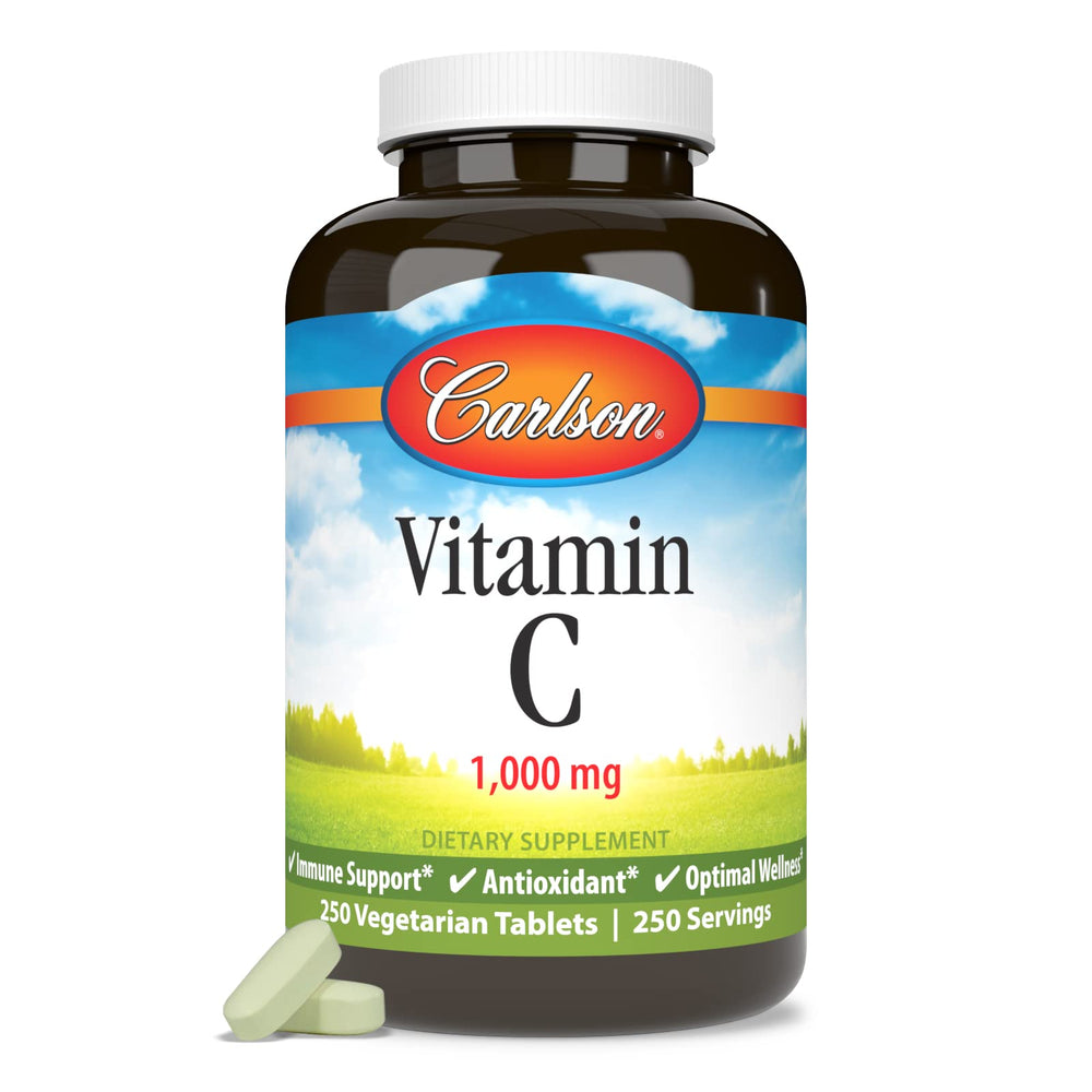 Carlson Vitamin C bottle on table for daily supplement routine