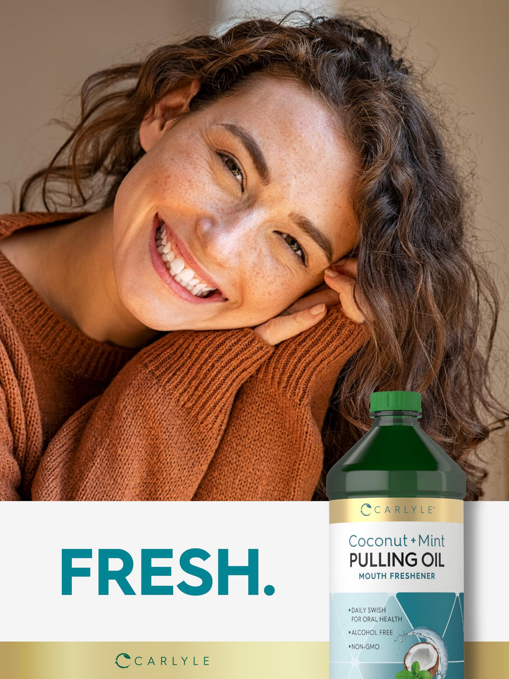 Carlyle pulling oil bottle featuring peppermint oil for routine oral care