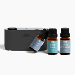 CE CRAFT waterless travel diffuser in hand, portable fragrance on the go.