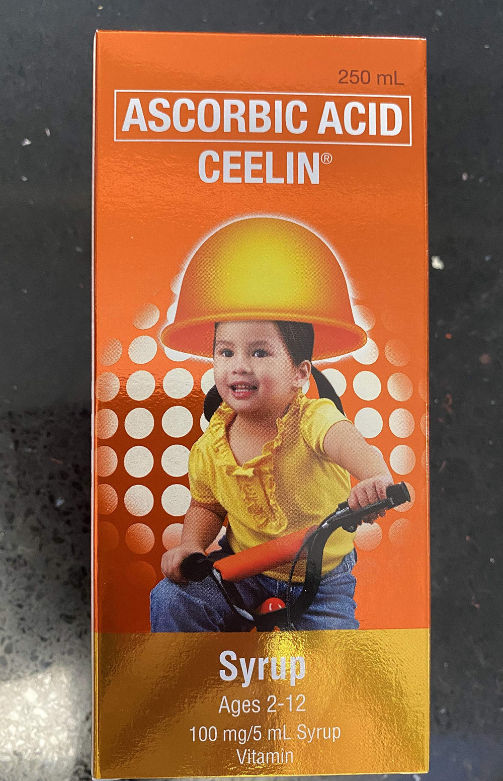 Ceelin vitamin C syrup bottle featuring kid-friendly orange flavor and immune support.