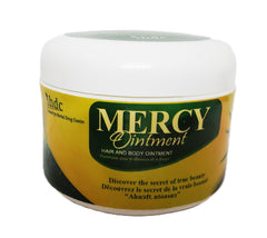 Chosen Mercy Ointment hair application close-up emphasizing scalp nourishment.