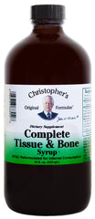 Christopher's Original Formulas Complete Tissue and Bone Syrup bottle on table supports tissue wellness.