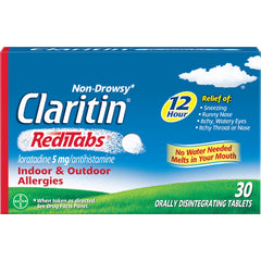 Close-up of Claritin tablet dissolving in the mouth for convenience.