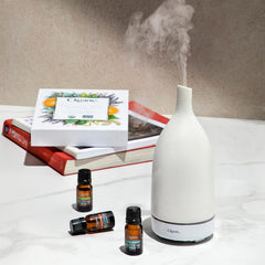 Cliganic tea tree essential oil bottle for DIY cleaning blends and fresh scents
