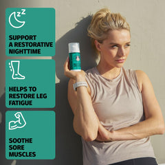 Applying Coach Soak magnesium oil spray to the arm for quick absorption.