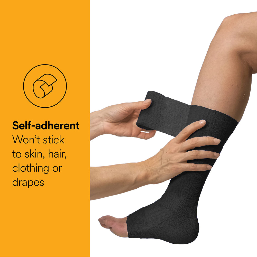 Coban NL wrap in black 2in demonstrates tear-by-hand usability.