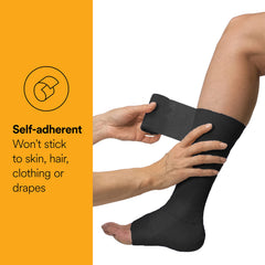 Coban NL wrap in black 2in demonstrates tear-by-hand usability.