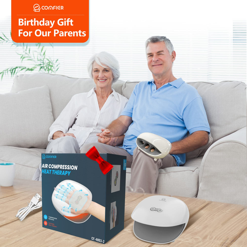 COMFIER hand massager in use with heat and compression for a comforting routine.