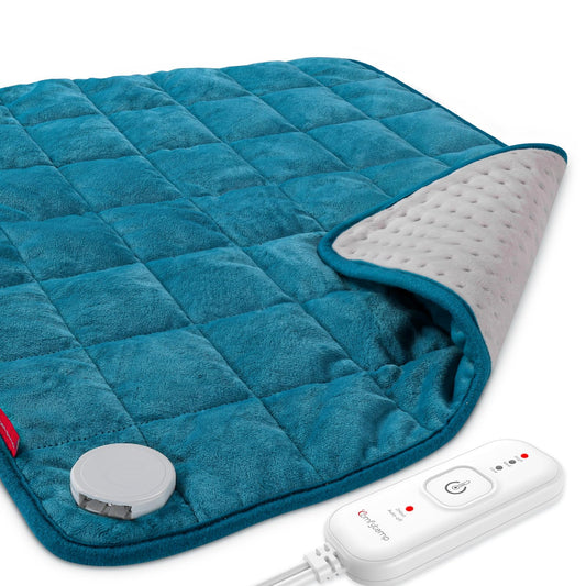 Comfytemp weighted heating pad on bed delivers full coverage for soothing warmth.