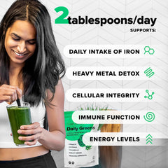 Complement Daily Greens Powder scoop beside glass for an energy boost