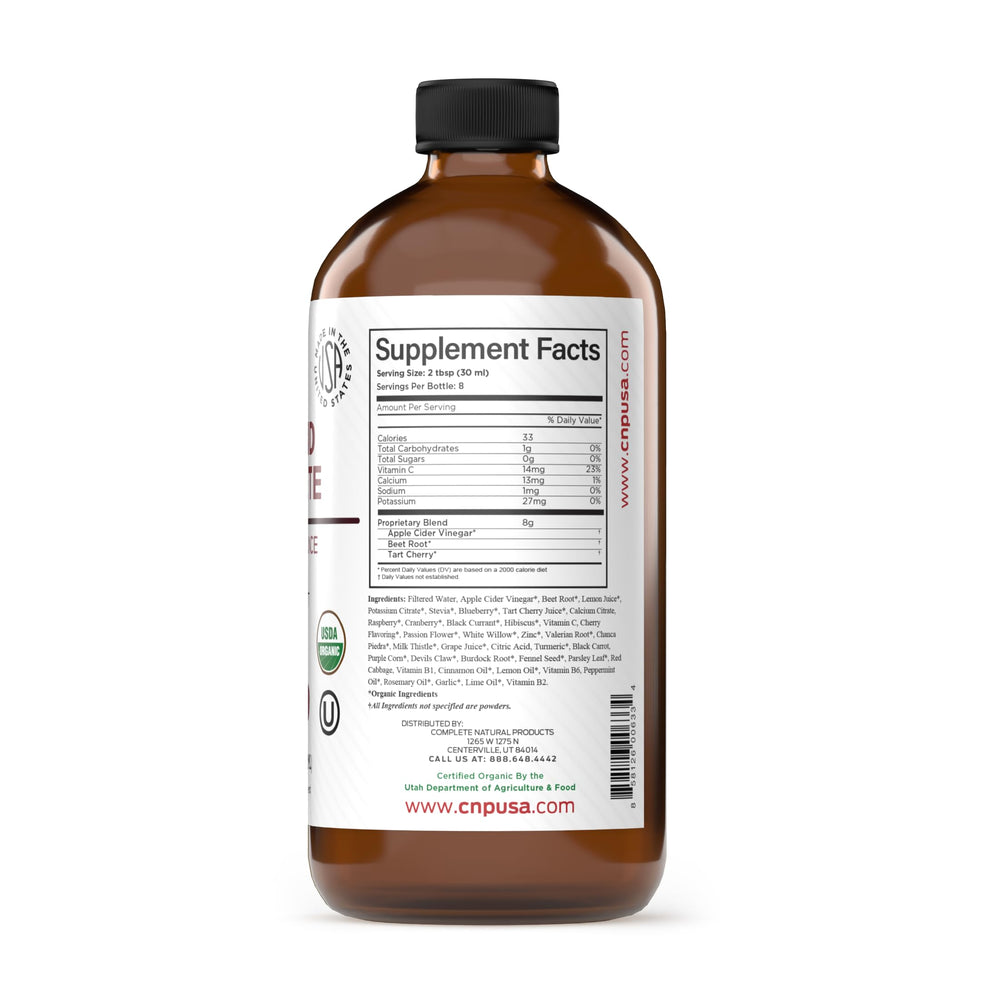 Complete Natural Products Uric Acid Complete liquid being poured for daily use.
