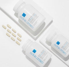Consult Health Age Proof bottle beside a glass of water