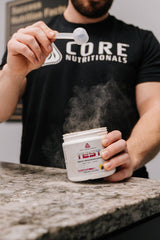 Core Nutritionals Test Vitality bottle cap close-up emphasizing daily use.