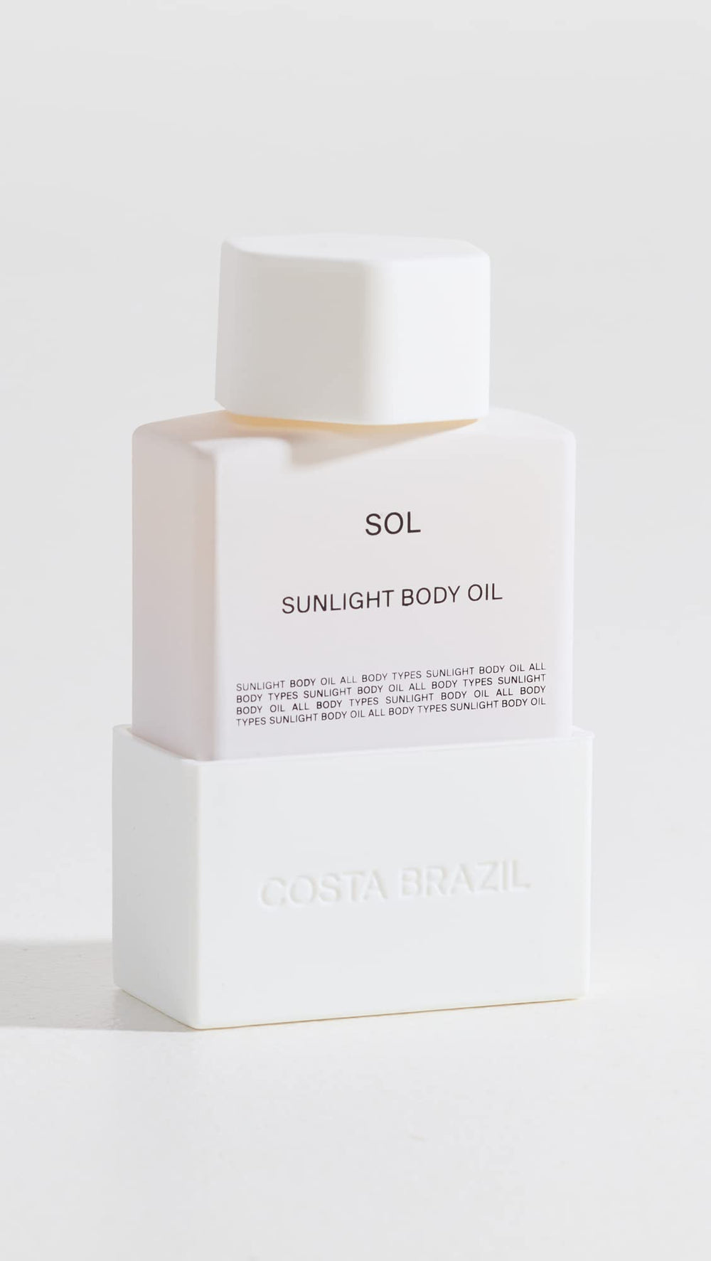 Costa Brazil Women's Sol Sunlight Body Oil on damp skin for massage