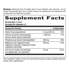 Country Life tablets in hand; portable daily supplement for bone support.
