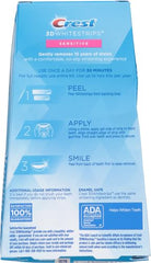 Crest 3D Whitestrips Sensitive top strip close-up, enamel-safe whitening.