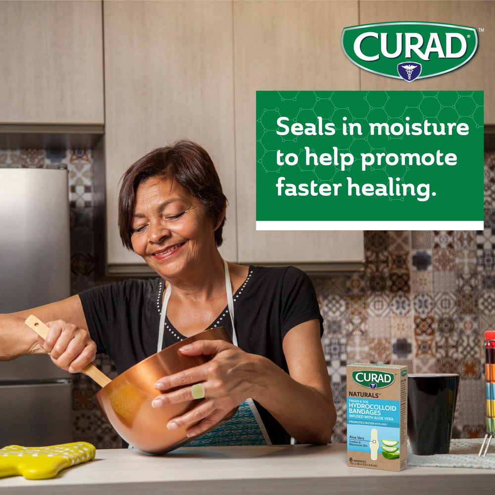 CURAD Naturals hydrocolloid bandage on finger, waterproof protection during activities.