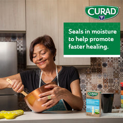 CURAD Naturals hydrocolloid bandage on finger, waterproof protection during activities.