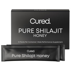 Cured Shilajit Honey Stick close-up on wood boosts natural energy
