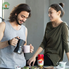 Dabur Chyawanprash Spread spoon serving a small portion for daily use