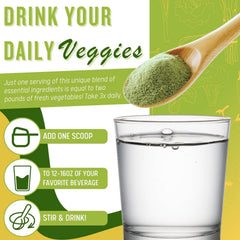 Glass of water with Ultimate Daily Greens ready to drink