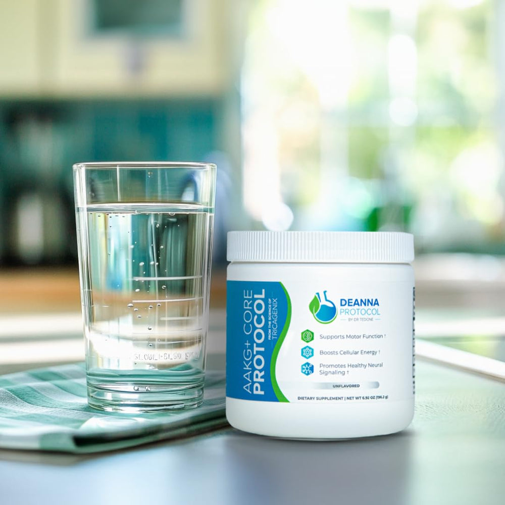 Deanna Protocol AAKG+ Core Powder being poured into a glass shows smooth texture and mixability.