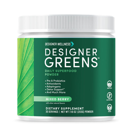 Designer Wellness Greens bottle on the counter for daily nutrition support.