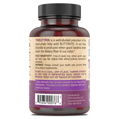 Close-up of DEVA Tributyrin capsules showing 500 mg per capsule dosage.