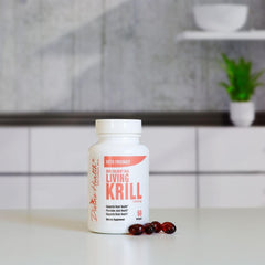 Divine Health Living Krill Oil softgels arranged for daily omega-3 intake.