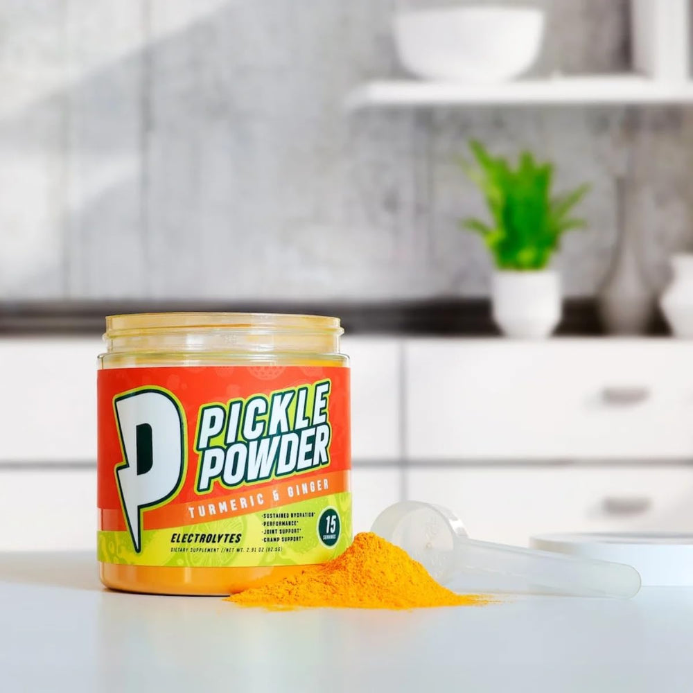 Divine Health Pickle Powder Lemon Zest dissolving in water for refreshment