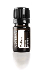 doTERRA Melissa oil bottle pour with bright citrus aroma for flavoring.