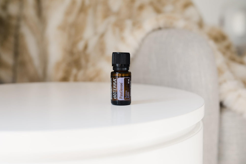 doTERRA PastTense cap closeup, sealing a soothing, cooling aroma.