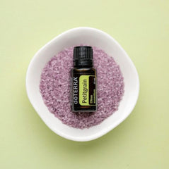 Close-up of Petitgrain oil diffused drops for room aroma.