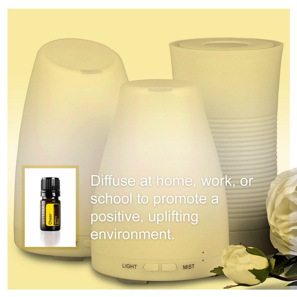 steam carrying doTERRA Cheer aroma in a cozy room.